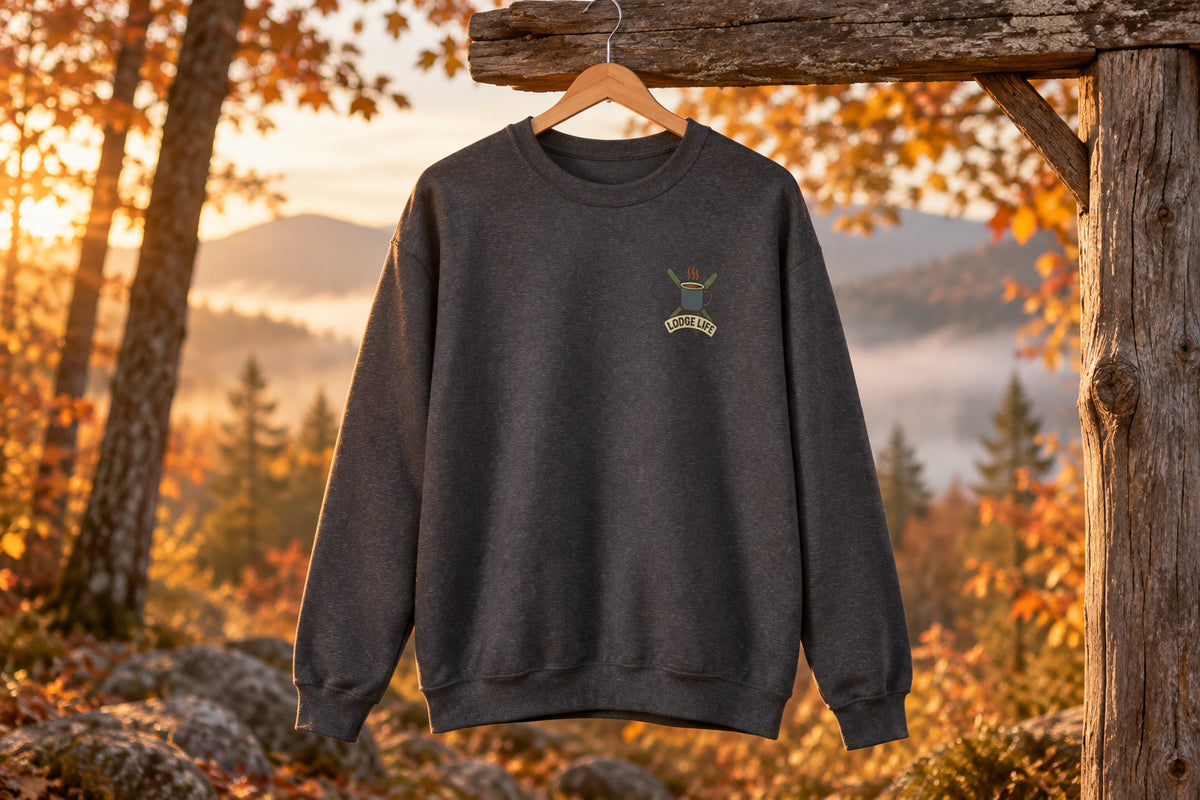 Ski Lodge Sweatshirt - Dark Heather on a wooden hanger outdoors | MR7ART