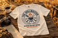 The Grillmaster T-shirt - White on a rustic wooden table | MR7ART