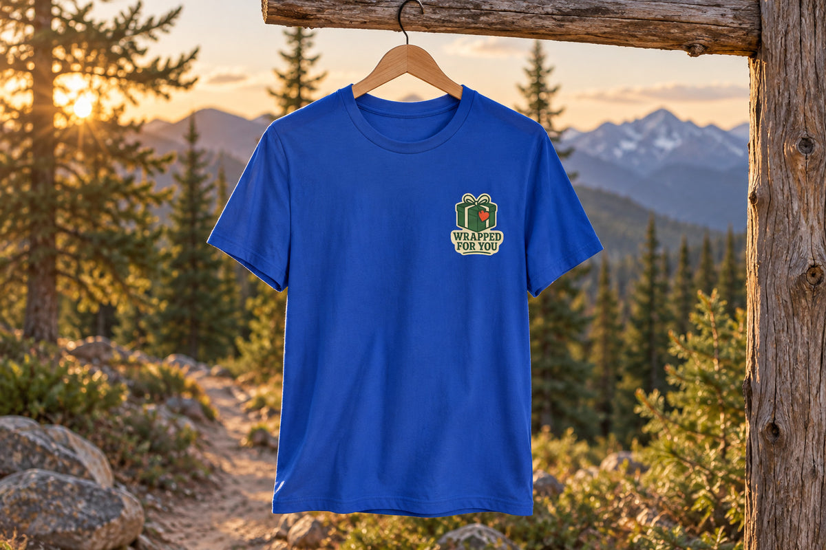 Holiday Gift Tee - True Royal on a wooden hanger outdoors | MR7ART