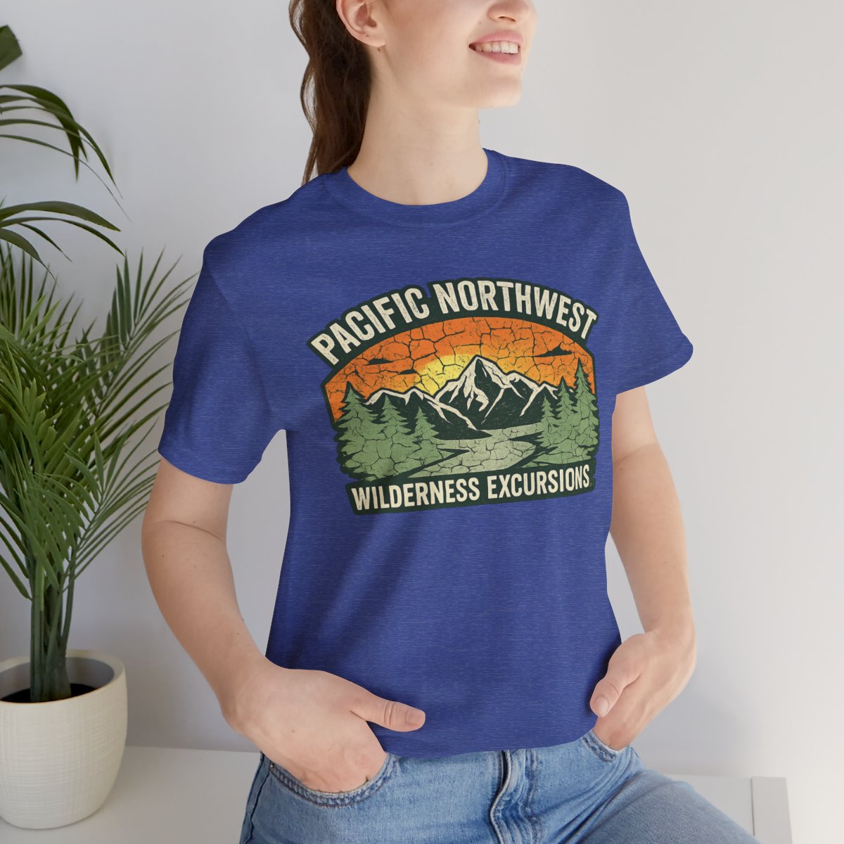 Pacific Northwest Wilderness Excursions T-Shirt - Heather True Royal worn by a model | MR7ART