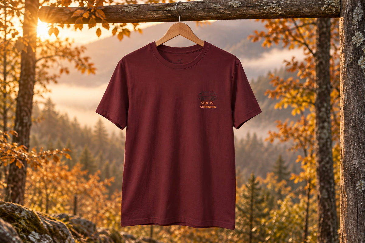 Surf Van Illustration Tee - Maroon on a wooden hanger outdoors | MR7ART