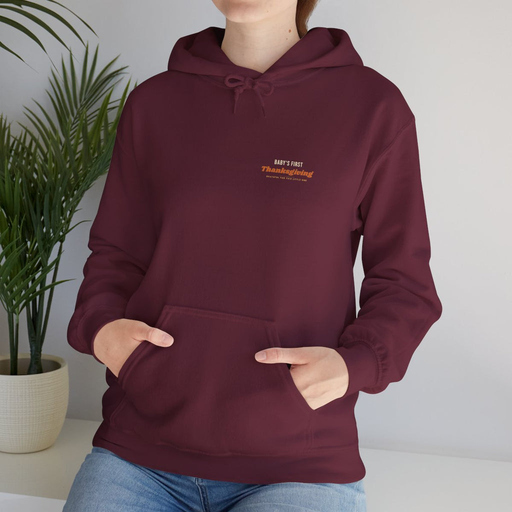 Baby's First Thanksgiving Hoodie - Maroon worn by a model | MR7ART