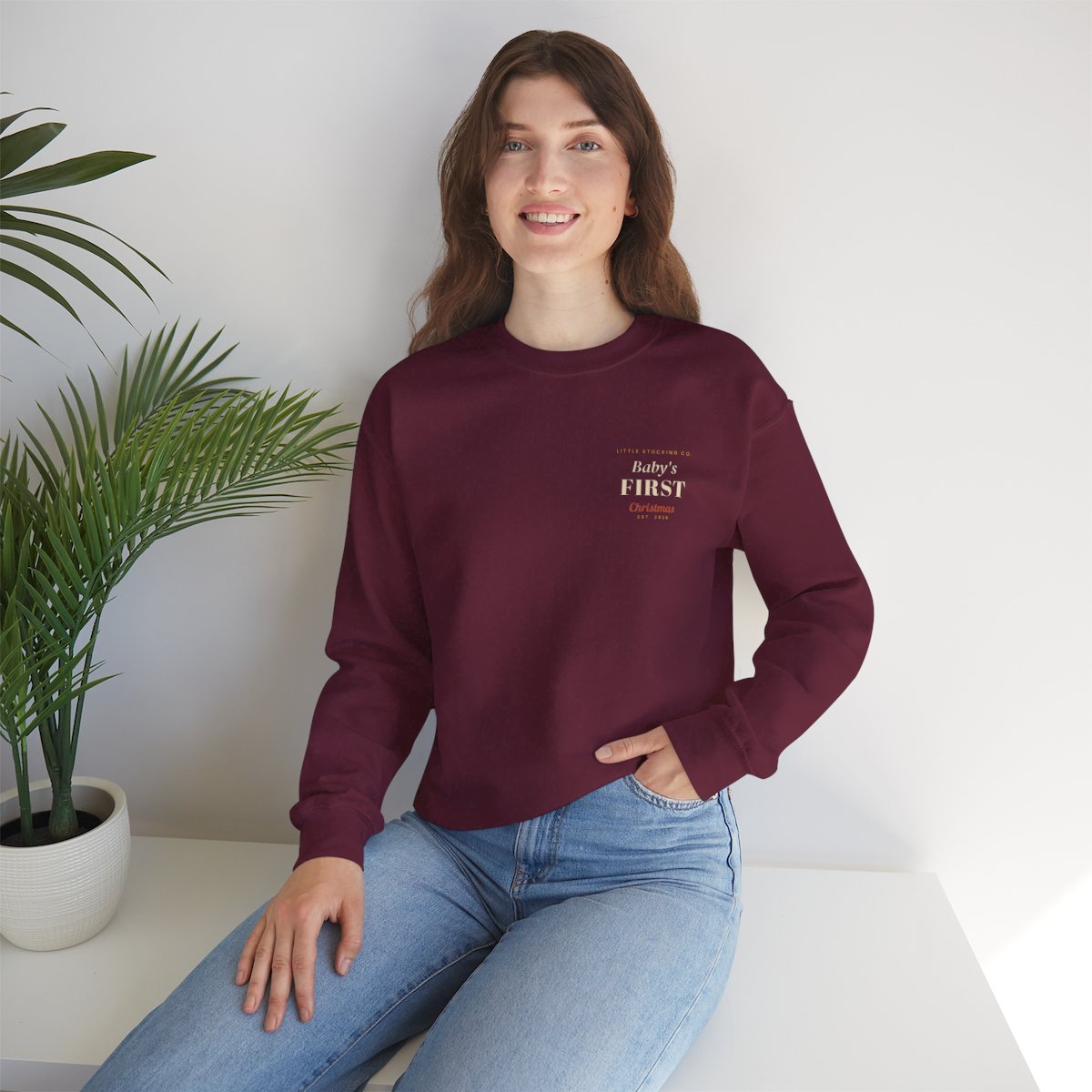 Baby's First Christmas Sweatshirt - Maroon worn by a model | MR7ART