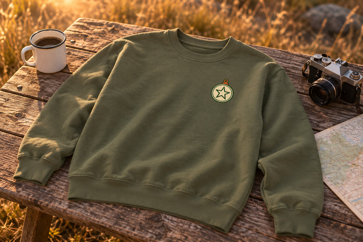 Christmas Ornament Sweatshirt - Military Green on a rustic wooden table | MR7ART