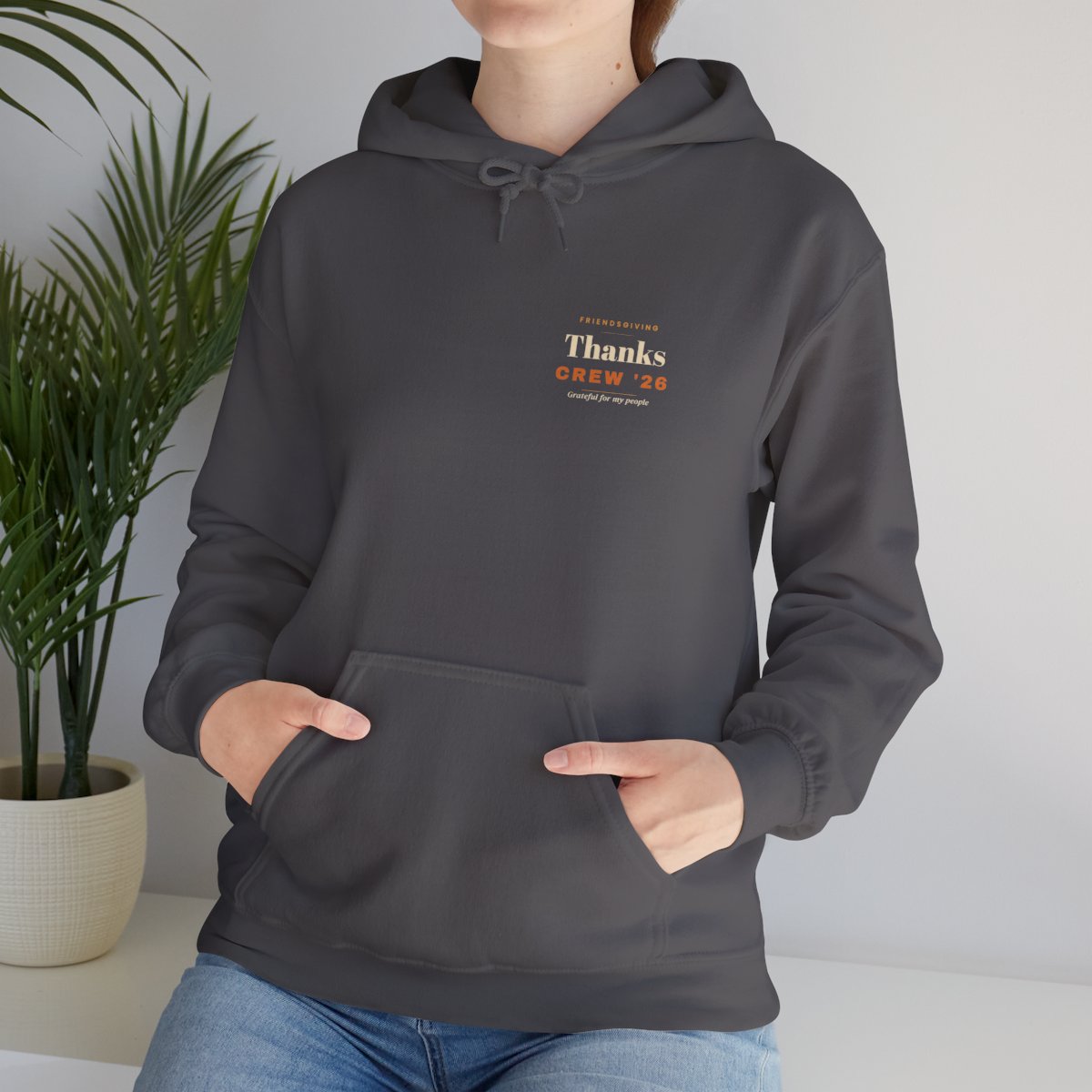 Friendsgiving Hoodie - Charcoal worn by a model | MR7ART