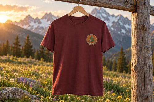 Christmas Tree Tee - Maroon on a wooden hanger outdoors | MR7ART