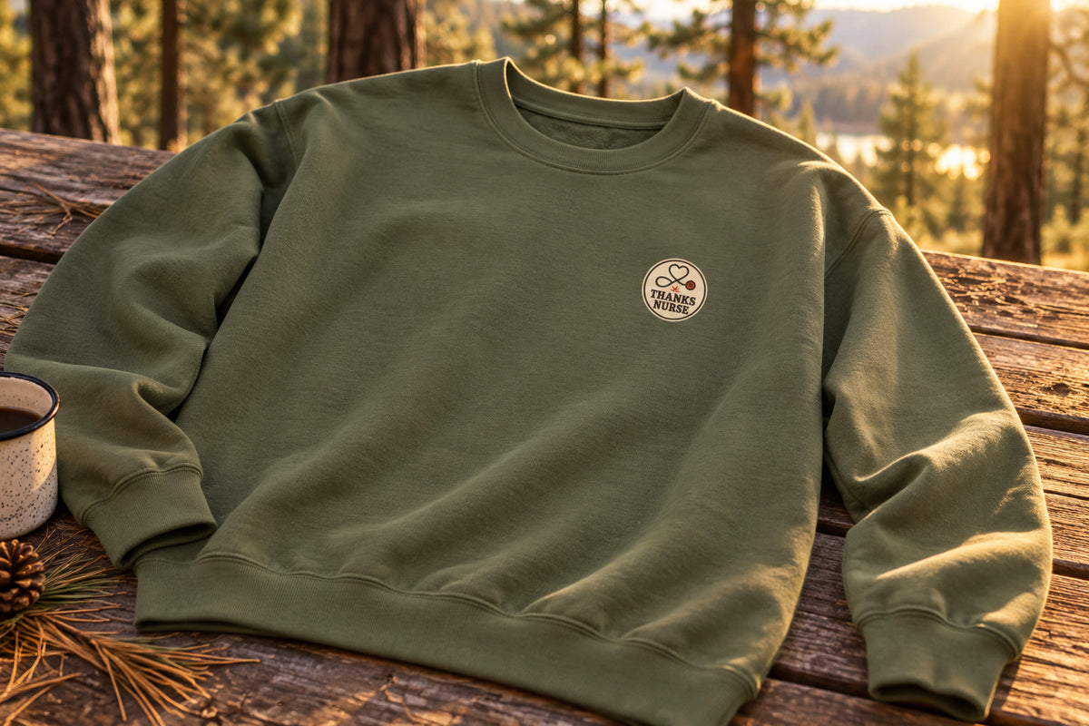Nurse Thanksgiving Sweatshirt - Military Green on a rustic wooden table | MR7ART