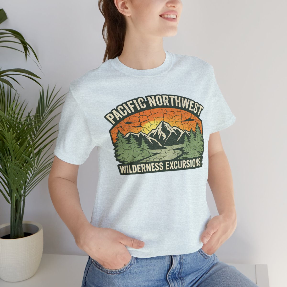 Pacific Northwest Wilderness Excursions T-Shirt - Heather Ice Blue worn by a model | MR7ART