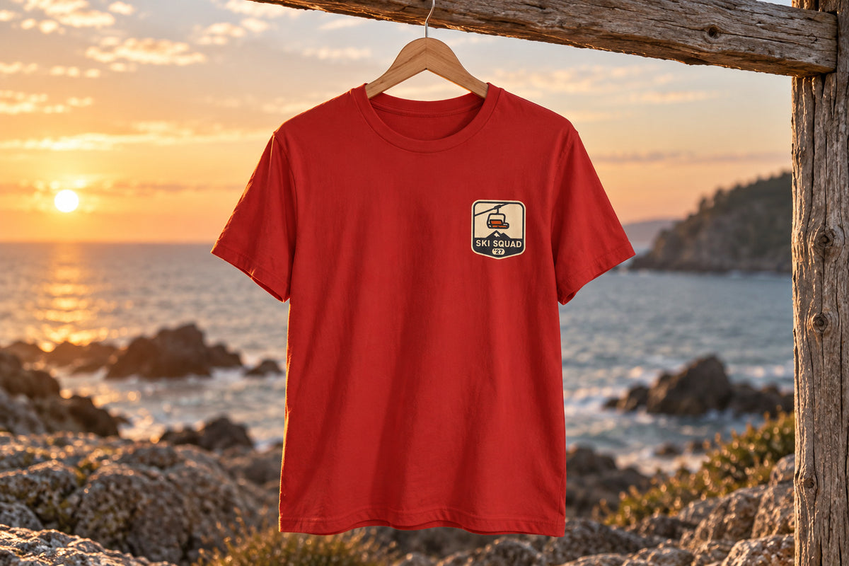 Ski Trip Tee - Red on a wooden hanger outdoors | MR7ART