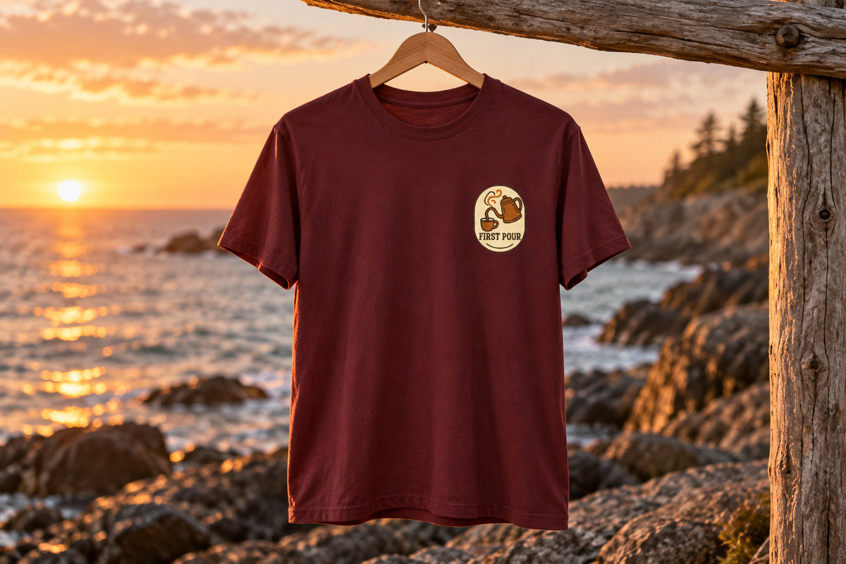 Pour Over Coffee Tee - Maroon on a wooden hanger outdoors | MR7ART