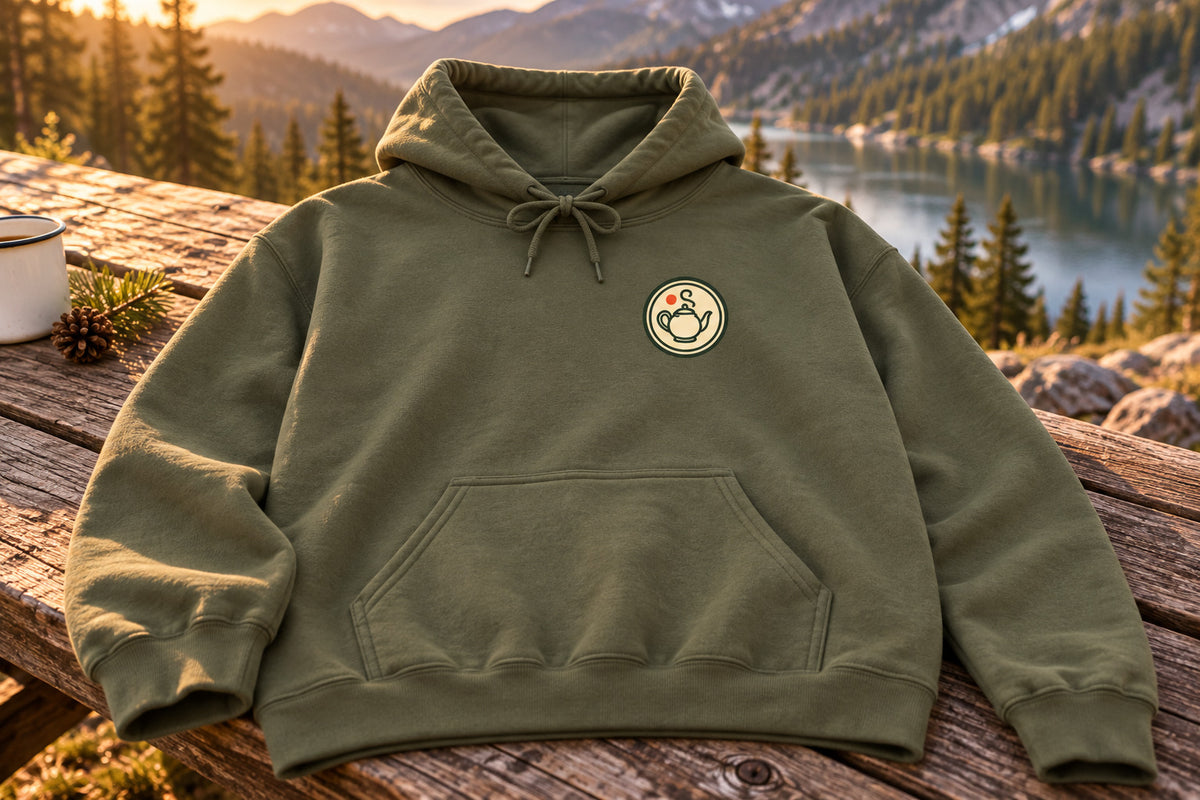 Vintage Teapot Hoodie - Military Green on a rustic wooden table | MR7ART
