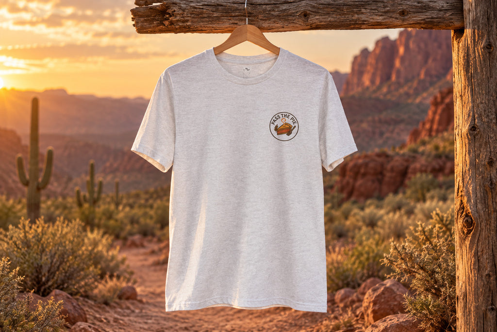 Friendsgiving Tee - Ash on a wooden hanger outdoors | MR7ART