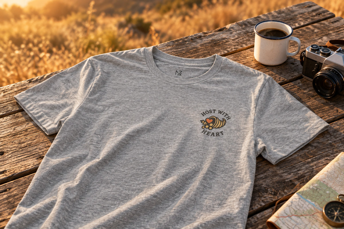 Thanksgiving Host Gift Tee - Athletic Heather on a rustic wooden table | MR7ART