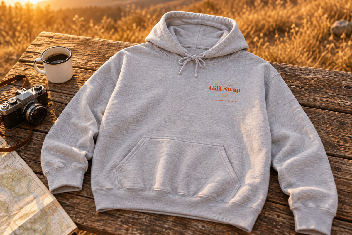 Secret Santa Hoodie - Sport Grey on a rustic wooden table | MR7ART