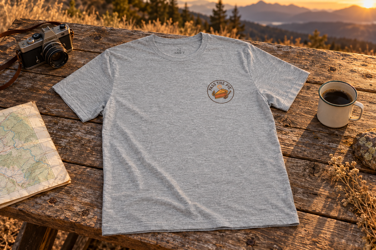 Friendsgiving Tee t-shirt on a rustic wooden table outdoors