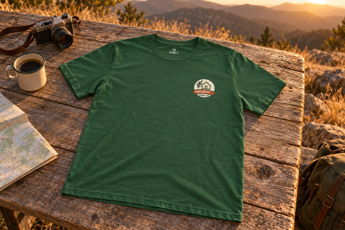 Family Holiday Matching Tee t-shirt on a rustic wooden table outdoors