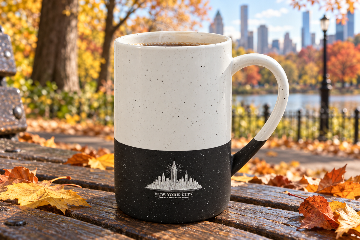 New York City skyline engraved speckled mug on a park bench in autumn